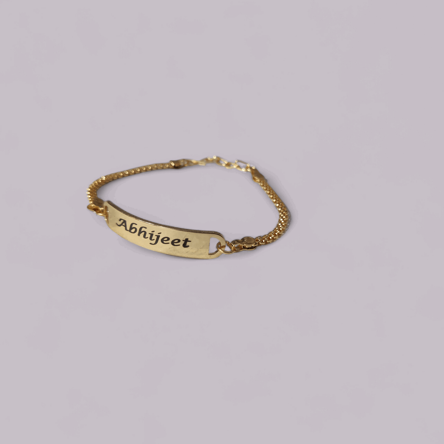 Golden Rakhi Bracelet - (With Stainless steel patti)