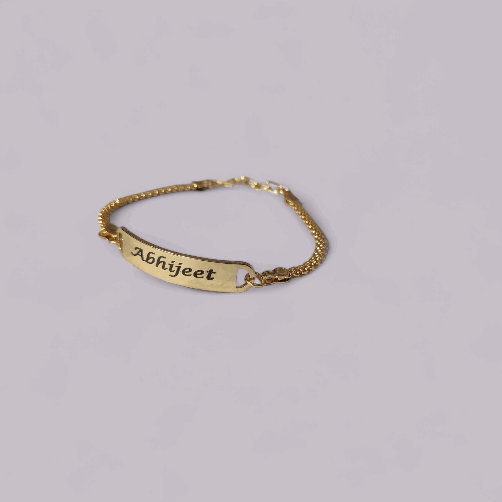 Golden Rakhi Bracelet - (With Stainless steel patti)